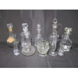 A collection of glassware including decanters, vases etc