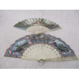 Two 19th hand painted Cantonese paper and ivory fans. The leaves painted with Chinese scenes to