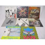 A collection of eight Hawkwind 12" vinyl records including In Search of Space, Hawklords (on grey