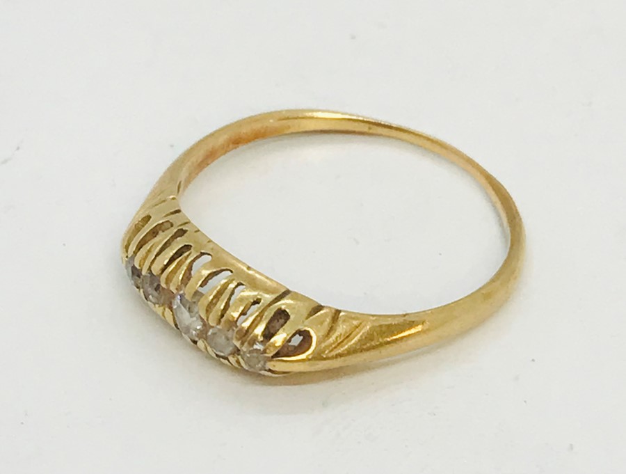 An unmarked ( probably 18ct gold) boat ring set with 5 diamonds - Image 3 of 4