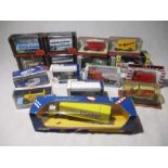 A collection of boxed die-cast vehicles including Gilbow First Editions Buses, Matchbox Models of