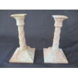 A pair of Royal Worcester blush candlesticks on square bases ( pattern number 1050)