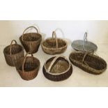 A collection of seven wicket baskets