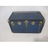 A blue storage trunk - length 92cm, height 50cm, depth 50cm