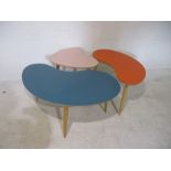 Three retro style kidney shaped melamine topped coffee tables by Judy Clarke