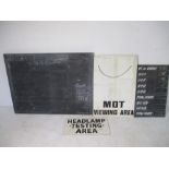 Four vintage wooden garage signs including "Headlamp Testing Area", "MOT Viewing Area" etc