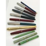 A collection of vintage pens including Parker etc