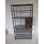 A handmade forged steel patinated kitchen shelving unit with zinc shelves and removable plate rack -
