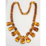 An amber necklace with cubed beads