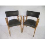 A pair of vintage office chairs - date stamped under seat 14 Sept 1973