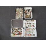 Three small Wheatley cases of various fishing fly's