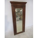 A Edwardian over mantle wooden framed mirror