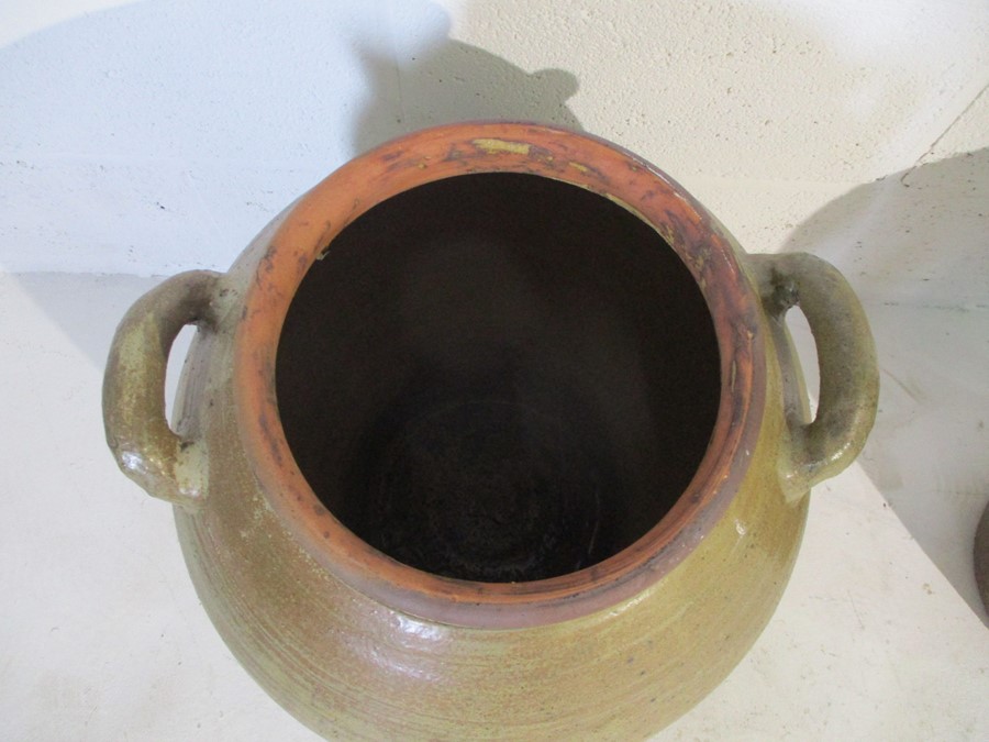 A large two handled glazed terracotta urn along with a large flagon - Image 4 of 11