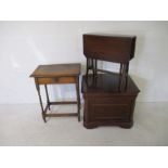 An oak occasional table with barley twist legs and single drawer, along with a Sutherland table