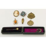 A small collection of costume jewellery including a silver tie pin, micro mosaic brooch, cameo,etc.