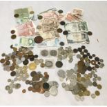 A collection of various British and foreign coinage and bank notes including approximately sixty
