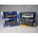 Two Universal Hobbies boxed die-cast Land Rovers including the Defender 110 Pick Up Defender