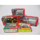 A collection of five boxed Britains die-cast models including a Land Rover Sheep Farmer Set, JCB