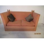 An upholstered 2 seater Knole sofa