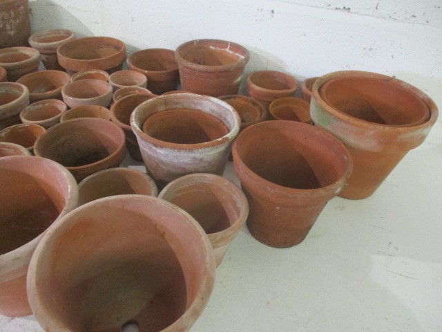 A large collection of terra cotta pots. - Image 3 of 7