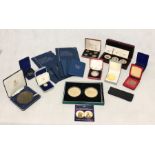 A collection of various commemorative coins including The Queen Elizabeth II 60 years bejewelled