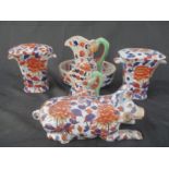 A collection of Imari patterned items including a jug and bowl, pig ornament etc.