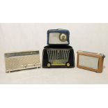 A collection of four vintage radios including Bush, Grundig, Philips and Dansette.