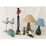A collection of various decorative items including two studio pottery style lamps, a pair of