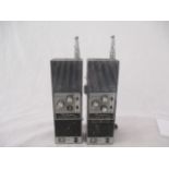 A pair of Tokai walkie talkies, seventeen transistor, five watt call signal, six channel. Marked