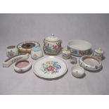 A collection of Poole Pottery including a biscuit barrel, pots, plate, bowl etc