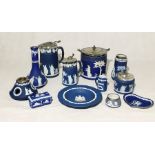 A collection of Wedgwood Jasperware including a 1924 Wembley miniature jug and silver rimmed bowl.