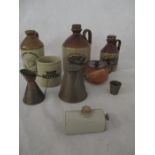 A small collection of stone ware flagons, metal ware and a miniature "Kozy" hot water bottle