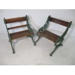 A pair of garden chairs with green painted cast iron ends - A/F