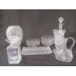 A selection of fifteen pieces of cut glassware including three decanters, a sweetmeat dish, three