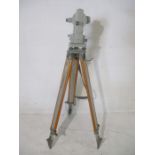 A vintage Carl Zeiss, Jena (Made in the DDR) Theodolite with vintage tripod and case.