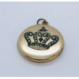 An unmarked gold locket set with seed pearls on the form of a Coronet