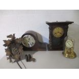 A collection of various clocks including a Cuckoo clock. (A/F)