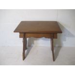 An Arts & Crafts oak stool