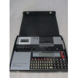 A Seiko pocket Computer ( MC-2200) with microcassette recorder & Printer (MC-220) combination (