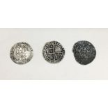 Three hammered silver coins, an Elizabeth I sixpence marked 1574, A James I sixpence marked 1605 and