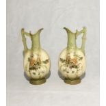 A pair of Turn Wien Depose jugs height 29cm