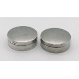 A pair of hallmarked silver lidded pots
