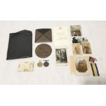 A WW1 death penny/plaque for Ernest Plowman, comes with original box and certificate along with