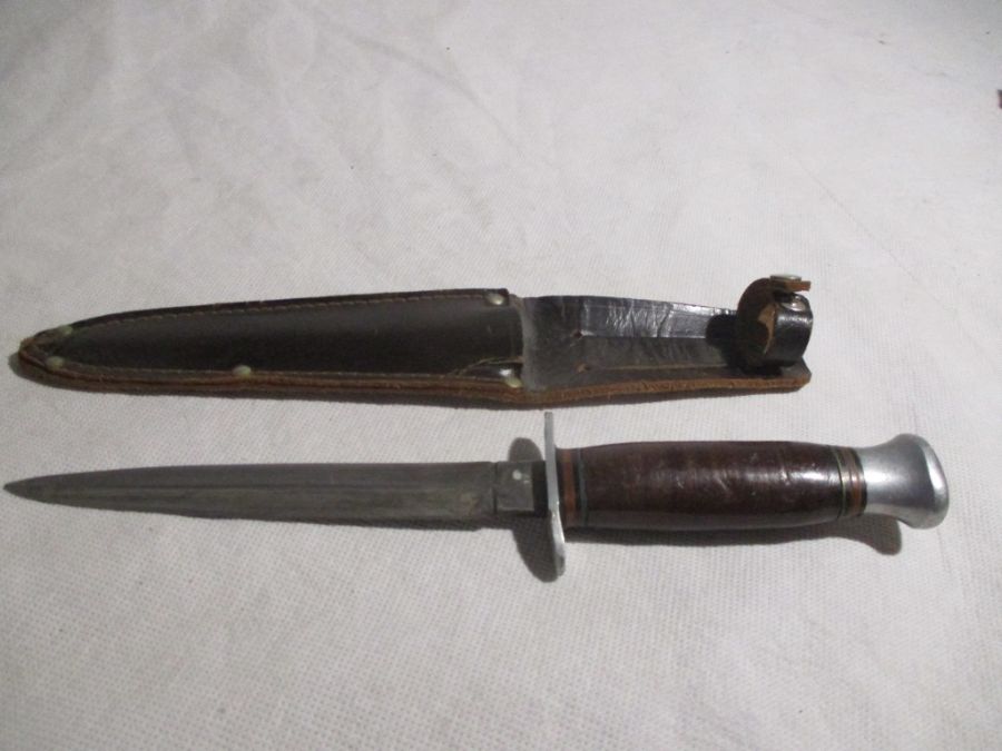 An Underhill & Co. knife in leather sheath along with a Commando style dagger( possibly by William - Image 6 of 10