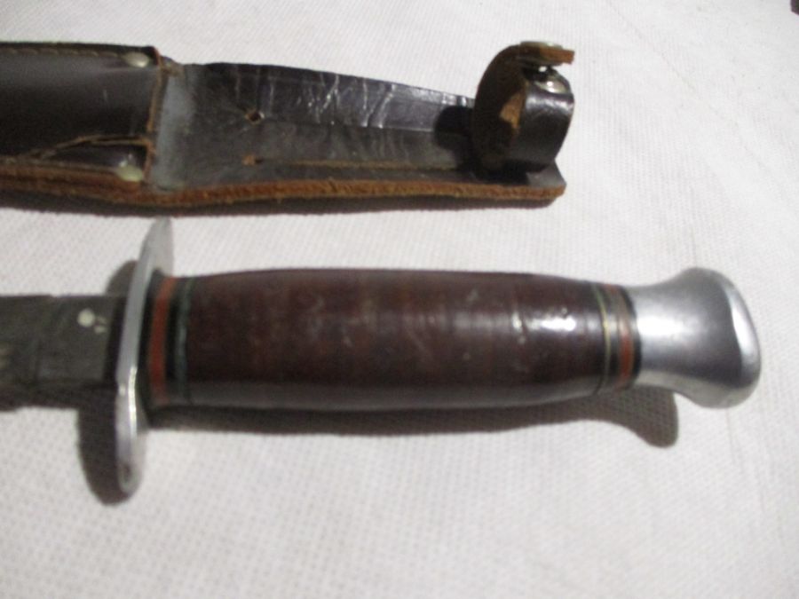 An Underhill & Co. knife in leather sheath along with a Commando style dagger( possibly by William - Image 7 of 10