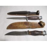 An Underhill & Co. knife in leather sheath along with a Commando style dagger( possibly by William