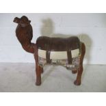 A footstool in the form of a camel