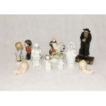 A collection of of various ornaments including Aynsley "Fagin", Edwardian continental figures,