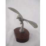 A mounted chromed figure of a bird in flight ( possibly a shooting trophy) height 14cm