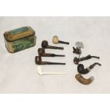 A collection of smoking pipes including a K&P Peterson etc.